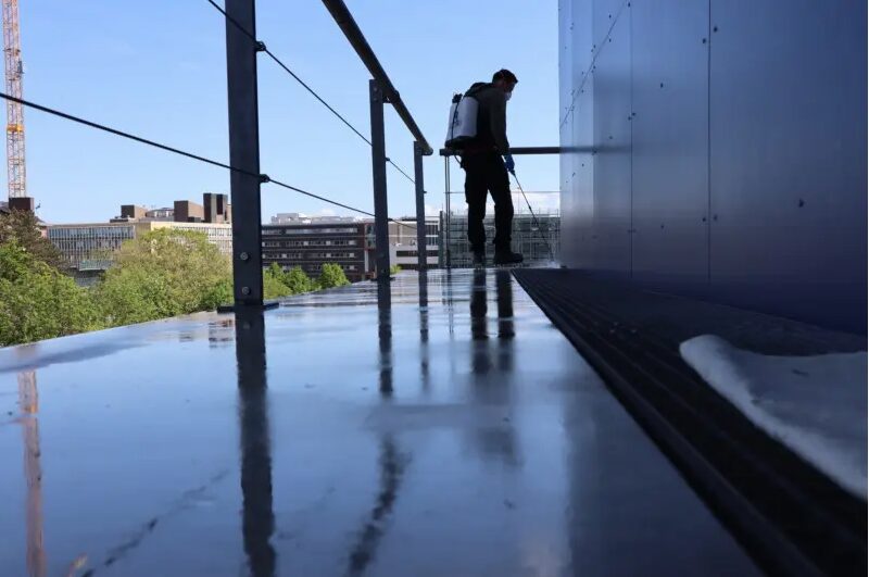 Repair of hairline cracks (0.2 mm) in the concrete balconies at LUMC hospital, Leiden (NL), with Basilisk bio-based self-healing concrete spray