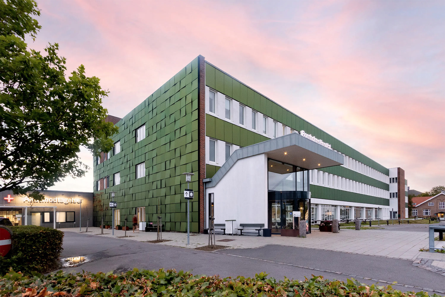 Retrofit with energy-positive envelope upgrade of the Bornholm Hospital in Rønne (Denmark) by Bjerg Arkitektur, with custom-designed BIPV panels by Solar Lab